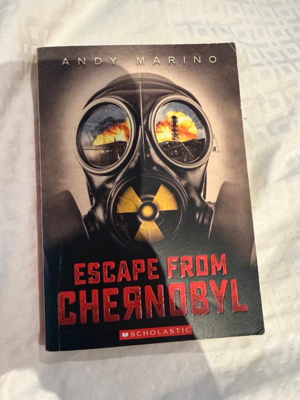 Scholastic Paperback — Black Cover with Red and Yellow Accents
